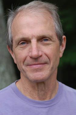 Liam Watt headshot with his kind eyes and warm smile